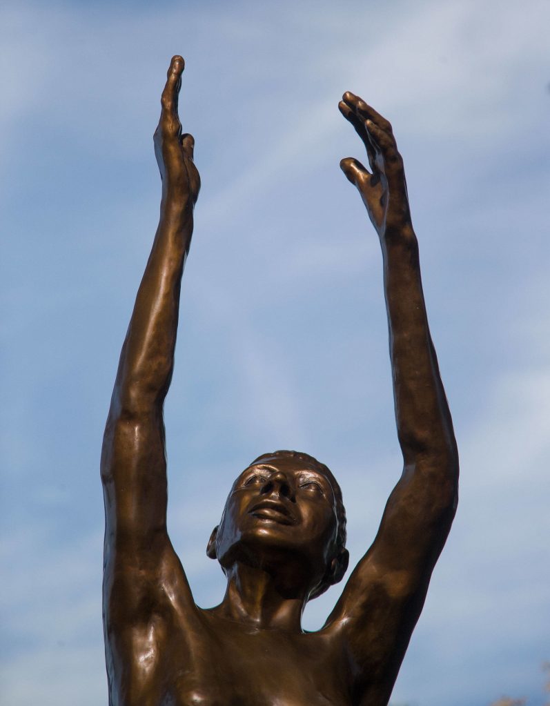 The We Rise statue is the newest of 14 sculptures at the 3.5-acre arboretum in north Everett. (Andy Bronson / The Herald)