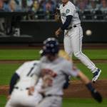 Mariners pitcher Nick Margevicius tries to throw the Astros Alex Bregman out at first during a game on Wednesday, Sept. 23, 2020, in Seattle. (Olivia Vanni / The Herald)