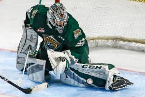 Everett's Dustin Wolf stops a shot at goal against Seattle Sunday evening at ShoWare Center in Kent on March 8, 2020. The Silvertips won 3-2. (Kevin Clark / The Herald)