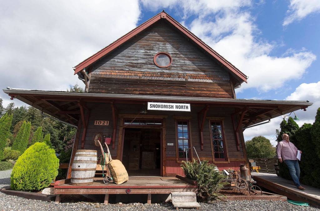Bruce Ferguson walks down a ramp at his home in Snohomish. (Andy Bronson / The Herald)