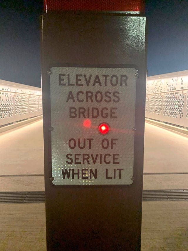 A sign and warning light at Grand Avenue Park alert people if the elevator is out of service, which happened Sept. 18 to 19 when someone knocked the elevator door out of its track. (City of Everett)