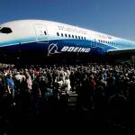 Herald staff photo by Michael O'Leary 070807DREAMLINER - The first Boeing 787 is swarmed by the crowd attending the roll out of the plane at the Boeing assembly facilty.