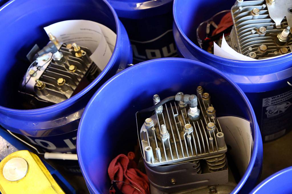 Small engines await distribution at Meadowdale High School in Lynnwood on Oct. 1, 2020. (Kevin Clark / The Herald)