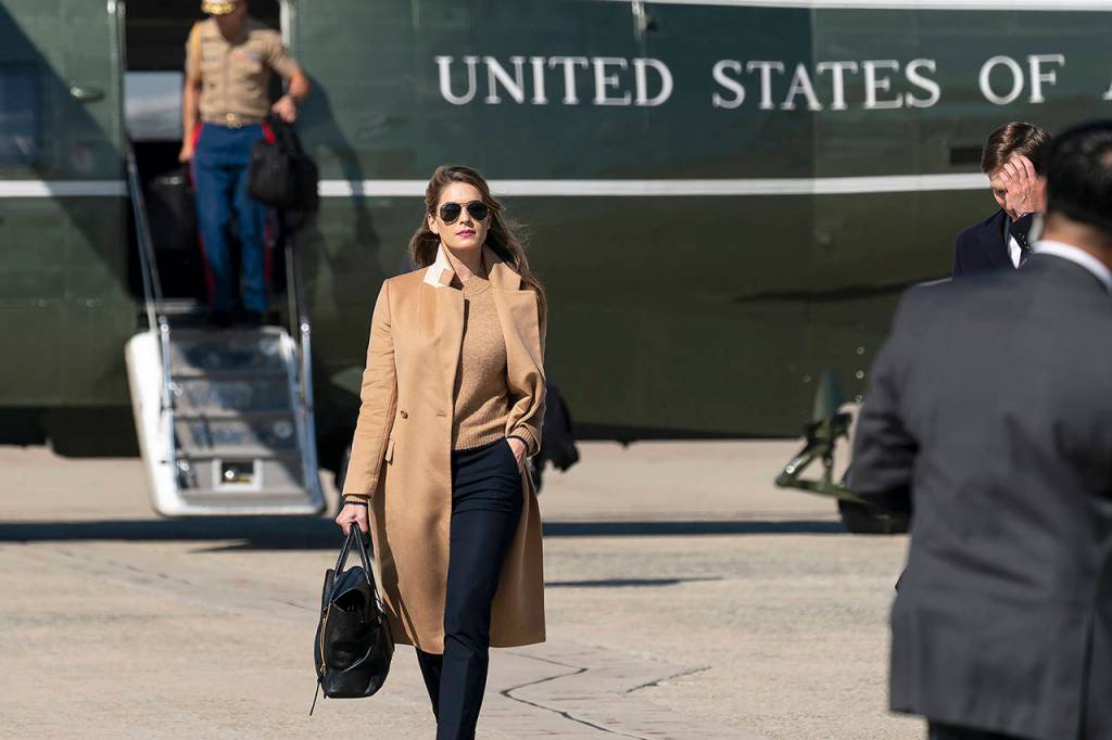 Counselor to the President Hope Hicks walks from Marine One to accompany President Donald Trump aboard Air Force One as he departs Wednesday at Andrews Air Force Base, Maryland. Hicks, President Donald Trump and first lady Melania Trump have all tested positive for the coronavirus. (AP Photo/Alex Brandon)