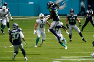 Seattle Seahawks safety Ryan Neal (35) intercepts a pass during the first half of Seattles 31-23 victory over the Miami Dolphins on Sunday at Hard Rock Stadium. (AP Photo/Lynne Sladky)