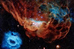 The Hubble's 30th anniversary image "Cosmic Reef" shows a vast star-forming region in the Large Magellanic Cloud, a satellite galaxy of the Milky Way, 163,000 light-years away. The image is nicknamed the "Cosmic Reef" because the nebulas resemble an undersea world. (NASA)