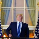 President Donald Trump returns to the White House Monday, Oct. 5, 2020, in Washington, after leaving Walter Reed National Military Medical Center, in Bethesda, Md. Trump announced he tested positive for COVID-19 on Oct. 2. (AP Photo/Alex Brandon)