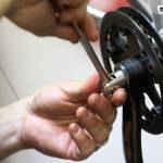 A volunteer gives a bike a tune-up May 30, 2019 at Sharing Wheels Community Bike Shop in Everett. The nonprofit is organizing weekly volunteer work parties Tuesday and Thursday to fix childrens bikes through Dec. 10. (Kevin Clark / Herald file)