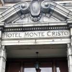 A printed note on letterhead taped crookedly on the front door informs the Monte Cristo Ballroom in downtown Everett is closed on Oct. 15, 2019. “We regret to inform you that as of today, we will no longer be doing business … This includes all weddings we have scheduled now through 2021,” it reads. (Andrea Brown / The Daily Herald)