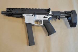 This undated image provided by the U.S. Attorney's Office in Seattle shows a homemade firearm that federal agents say was recovered on Feb. 6, 2020, from the Edmonds, Washington, home of Nathan Brasfield. In a criminal complaint unsealed in U.S. District Court, agents said that Brasfield had amassed an arsenal of homemade weapons despite being on federal supervision following his conviction on an earlier gun charge. (U.S. Attorney's Office via AP)