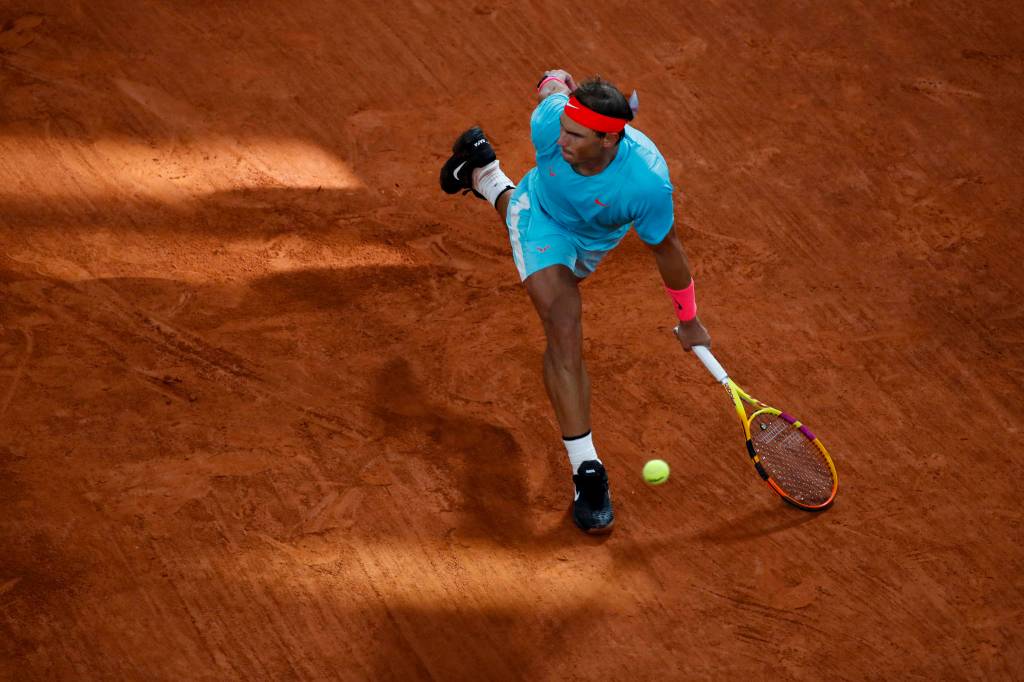 Spain's Rafael Nadal plays a shot against Serbia's Novak Djokovic in the final match of the French Open tennis tournament at the Roland Garros stadium in Paris, France, Sunday, Oct. 11, 2020. (AP Photo/Alessandra Tarantino)