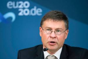 Valdis Dombrovskis, Vice-President of the EU Commission, speaks at a press conference in Berlin, Germany, following the informal talks of the EU Trade Ministers on Monday, Sept. 21, 2020.  (Bernd von Jutrczenka/Pool via AP)