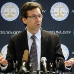 Washington state Attorney General Bob Ferguson speaks during a news conference about Fergusons lawsuit, challenging a Trump Administration practice of ICE arrests at courthouse, in December, 2019, in Seattle. Washington state sued the Trump administration over its practice of arresting people at courthouses for immigration violations, saying it interferes with the states authority to run its own judicial system. (Elaine Thompson / Associated Press)