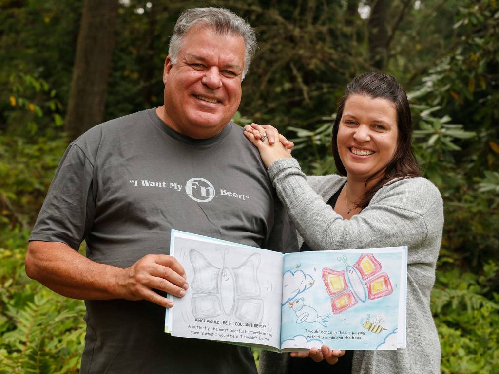 Jim Jamison and his daughter, Stephanie Schisler, wrote and illustrated What Would I Be If I Couldnt Be Me. (Kevin Clark / The Herald)
