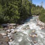 The Sauk River rushes by near a popular boat launch area close to White Chuck Mountain off the Mountain Loop Highway, just outside of Darrington. (Daniella Beccaria / Herald file)