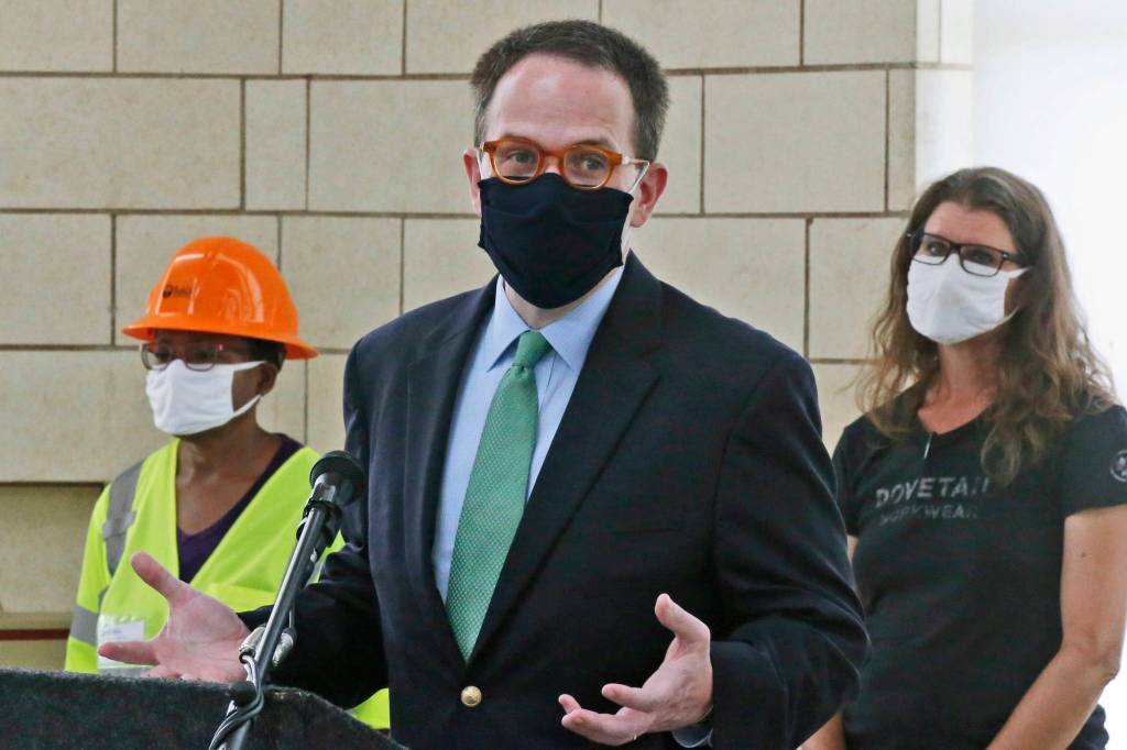 FILE - In this July 17, 2020, file photo, Tulsa Mayor G.T. Bynum speaks during a news conference as work continues on an excavation of a potential unmarked mass grave from the 1921 Tulsa Race Massacre, at Oaklawn Cemetery, in Tulsa, Okla. A second excavation begins Monday, Oct. 19, 2020, at a Tulsa cemetery in search of people killed in the massacre in an effort to identify the victims and shed light on the violence. (AP Photo/Sue Ogrocki File)