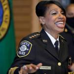 Then-Seattle Police Chief Carmen Best laughs during a light moment at a news conference Aug. 11 in Seattle. Best, the first Black woman to lead Seattles police department, stepped down in September following cuts to her budget that would reduce the department by as many as 100 officers. (AP Photo/Ted S. Warren, file)