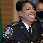 Seattle Police Chief Carmen Best laughs during a light moment at a news conference, Tuesday, Aug. 11, 2020, in Seattle. Best, the first Black woman to lead Seattle's police department, announced she will be stepping down in September following cuts to her budget that would reduce the department by as many as 100 officers. (AP Photo/Ted S. Warren)