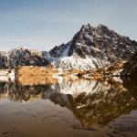 The top photo of Mount Stuart reflecting in Lake Ingalls near Cle Elum was taken with film, the bottom one with an iPhone. (Christina Hickman)