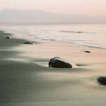 The combination of wildfire smoke high in the atmosphere and sunset colors made for a watercolor-like effect in film. This photo is of Dungeness Spit near Sequim. (Christina Hickman)