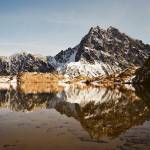 The top photo of Mount Stuart reflecting in Lake Ingalls near Cle Elum was taken with film, the bottom one with an iPhone. (Christina Hickman)