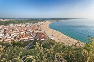 Nazaré hugs its wide beach on the Atlantic. (Dominic Arizona Bonuccelli, Rick Steves' Europe)