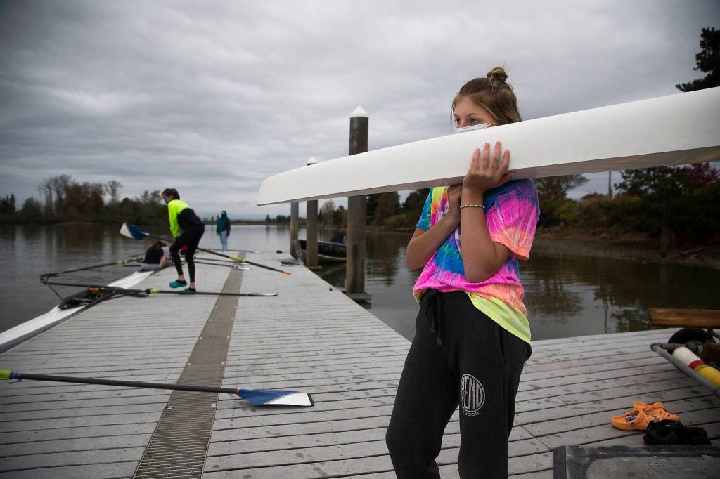 Everett Rowing Association junior teams have been rowing in single sculls, and a few doubles, during the coronavirus pandemic. (Andy Bronson / The Herald)