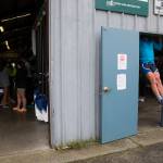 Owen Moody uses a doorway to do pull-ups as rowers with the Everett Rowing Association meet in the boathouse before heading out for practice. (Andy Bronson / The Herald)
