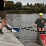 Ray Johnson gets a helping foot from Garrett Urvater to cast away from the dock. (Andy Bronson / The Herald)