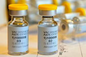 This September 2020 photo provided by Johnson & Johnson shows vials for a single-dose COVID-19 vaccine being developed by the company. On Friday, Oct. 23, 2020, Johnson & Johnson announced that the Food and Drug Administration is letting it resume testing of its COVID-19 vaccine candidate in the U.S. (Cheryl Gerber/Johnson & Johnson via AP)