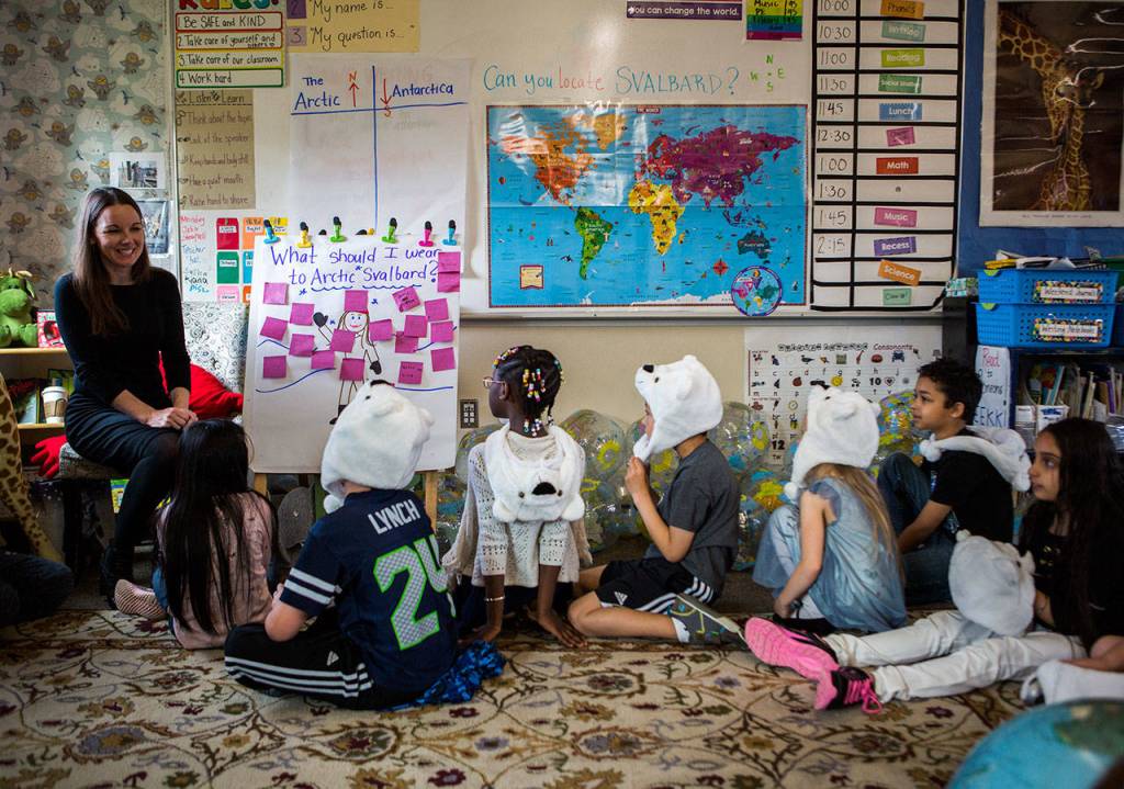 Jennie Warmouth talks with her class about the supplies and clothing suggestions they gave her on what she should bring with her to Antarctica during class at Spruce Elementary on Wednesday, May 8, 2019 in Lynnwood, Wash. (Olivia Vanni / The Herald)