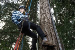 Its takes ropes and some climbing for Scott Greeley to work on his energy-saving distillation system, built 43 feet up in a tree on Tuesday, Oct. 20, 2020 in Edmonds, Washington. Greeley has designed an energy-saving device that can purify water or distill alcohol using a low-fuel pump and gravity instead of a power-consuming compressor.
“We need better ways to produce clean water around the world,” said Greeley of the gravity-pressurized distillation system. (Andy Bronson / The Herald)