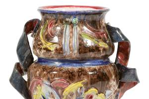 This pottery vase by Vally Wieselthier has typical, colorful Wiener Werkstatte decorations. It was made around 1925 in Austria. 

(c) 2020 by Cowles Syndicate Inc.