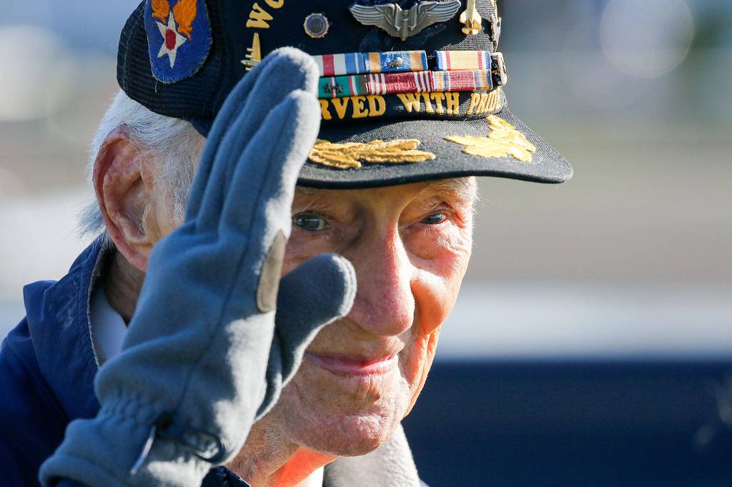 Art Unruh, World War II veteran, celebrates a couple days before his 98th birthday with a parade and vintage warplane flyover Sunday afternoon at the Arlington Airport. (Kevin Clark / The Herald)