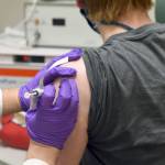 This May 4 photo shows the first patient enrolled in Pfizers COVID-19 coronavirus vaccine clinical trial at the University of Maryland School of Medicine in Baltimore. On Monday, Pfizer said an early peek at its vaccine data suggests the shots may be 90% effective at preventing COVID-19. (Courtesy of University of Maryland School of Medicine via AP, File)