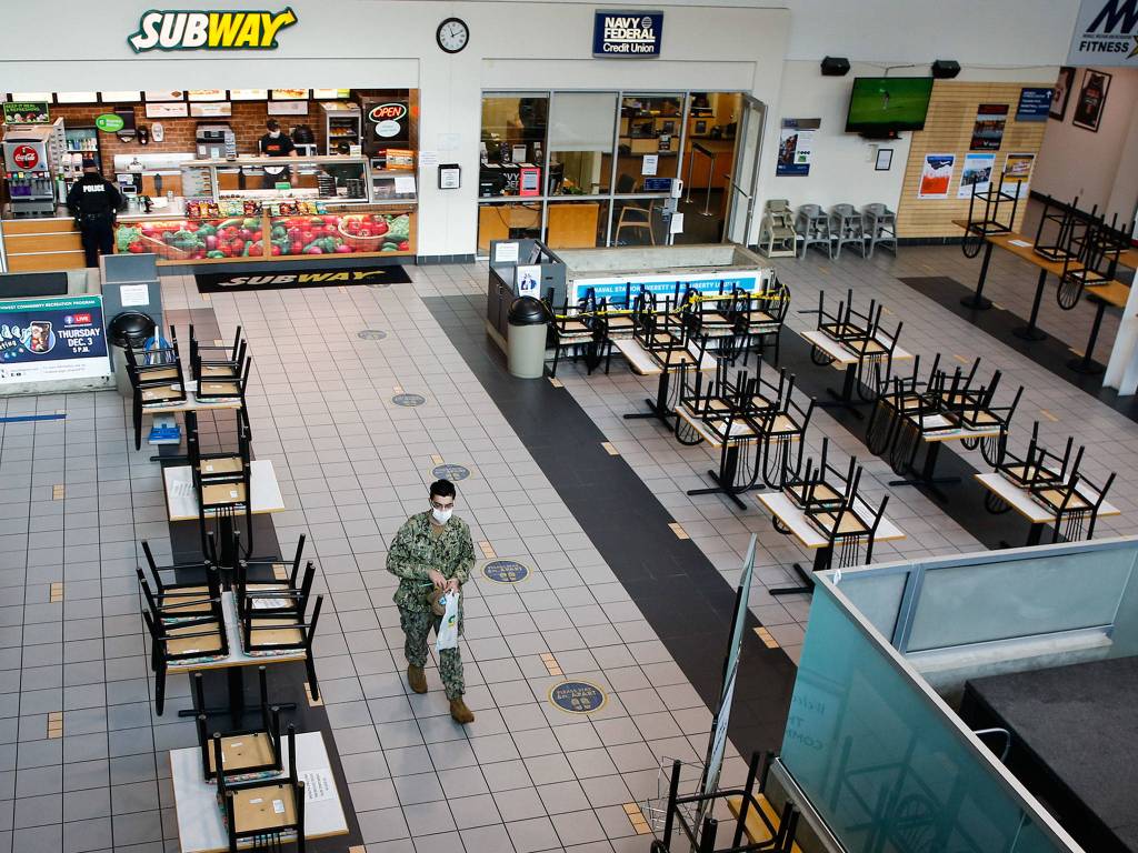 Tables and chairs are unavailable at The Commons at Naval Station Everett due to coronavirus restrictions. (Kevin Clark / The Herald)