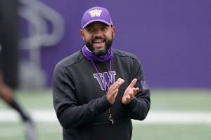 Washington head coach Jimmy Lake calls to his team during NCAA college football practice, Friday, Oct. 16, 2020, in Seattle. (AP Photo/Ted S. Warren)