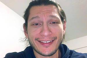 In this photo provided by his attorney, Gaven Picciano, 26, of the Keweenaw Indian Community in Michigan, poses for a self-portrait on Friday, Nov. 13, 2020. Picciano is suing the Clark County Jail in Washington state as well as its medical provider, saying he lost about 35 pounds and was malnourished to the point of unconsciousness during a three-week stay early this year because staff failed to provide him gluten-free food to accommodate his celiac disease. The county declined to comment on the case. The medical provider, NaphCare Inc., did not respond to a request for comment. (Gaven Picciano via AP)