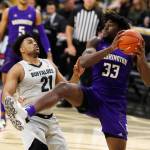 Washington forward Isaiah Stewart (right), pulls in a rebound as Colorado forward Evan Battey defends during the first half of a game Jan. 25, 2020, in Boulder, Colo. (AP Photo/David Zalubowski)