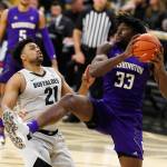 Washington forward Isaiah Stewart, right, puills in a rebound as Colorado forward Evan Battey defends in the first half of an NCAA college basketball game Saturday, Jan. 25, 2020, in Boulder, Colo. (AP Photo/David Zalubowski)