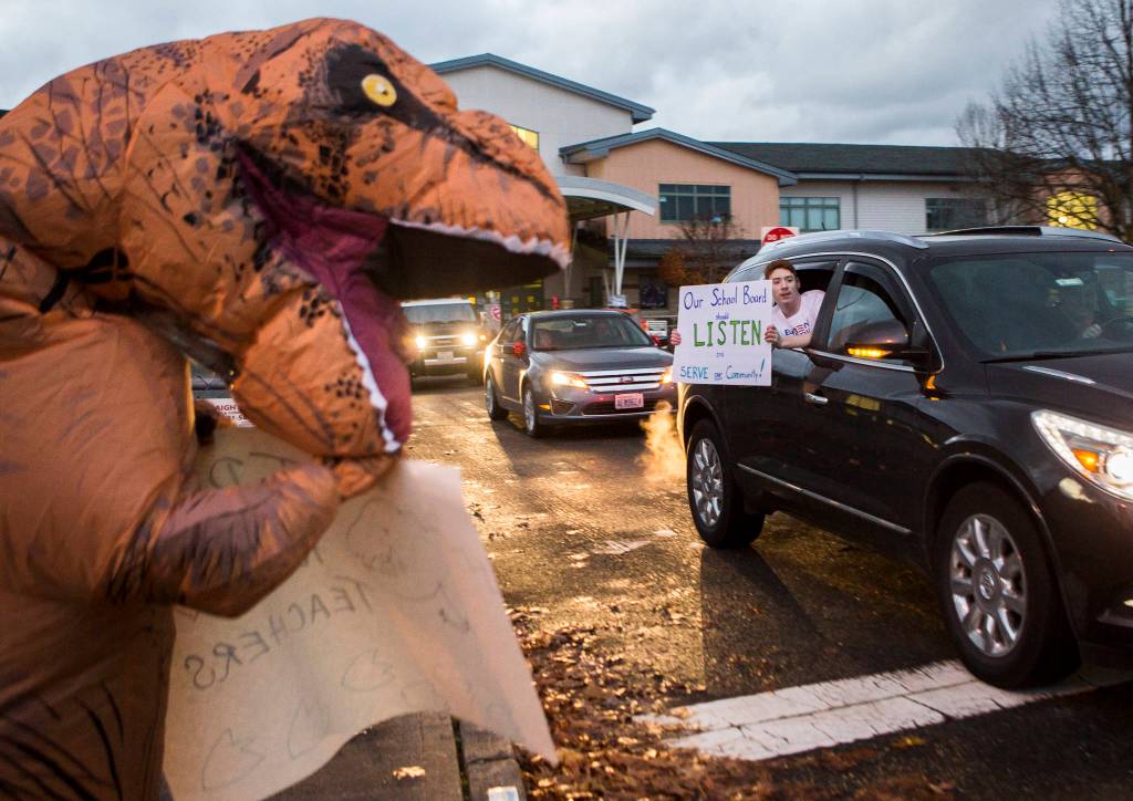 A parade and rally in support of teachers on Thursday in Monroe. (Olivia Vanni / The Herald)