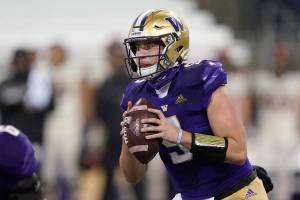 Washington quarterback Dylan Morris looks for a receiver during the first half of the team's NCAA college football game against Oregon State, Saturday, Nov. 14, 2020, in Seattle. (AP Photo/Ted S. Warren)