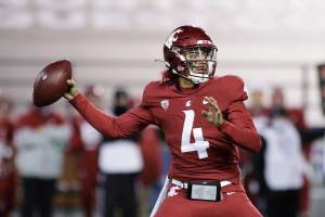 Washington State quarterback Jayden de Laura (4) throws a pass during the second half of the team's NCAA college football game against Oregon in Pullman, Wash., Saturday, Nov. 14, 2020. Oregon won 43-29. (AP Photo/Young Kwak)