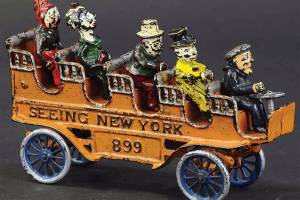 This toy tourist bus was made about 1910 by the Kenton Hardware Co. in Ohio. Not all of the passengers were part of the original toy, but suitable replacements had been found. It is a rare toy, so rare it auctioned for a little over $1,000. (Cowles Syndicate Inc.)