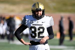 Vanderbilt place kicker Sarah Fuller warms up before the start of an NCAA college football game against Missouri Saturday, Nov. 28, 2020, in Columbia, Mo. (AP Photo/L.G. Patterson)