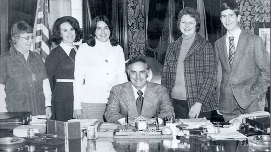 In this 1971 photo, Gov. Dan Evans signs House Bill 90 Education for All into law, flanked by the people who wrote and lobbied it into existence: Janet Taggart, Katie Dolan, Cecile Lindquist, Evelyn Chapman, and law student George Breck. Fellow law student Bill Dussault, also part of the team, not pictured. (Submitted photo)