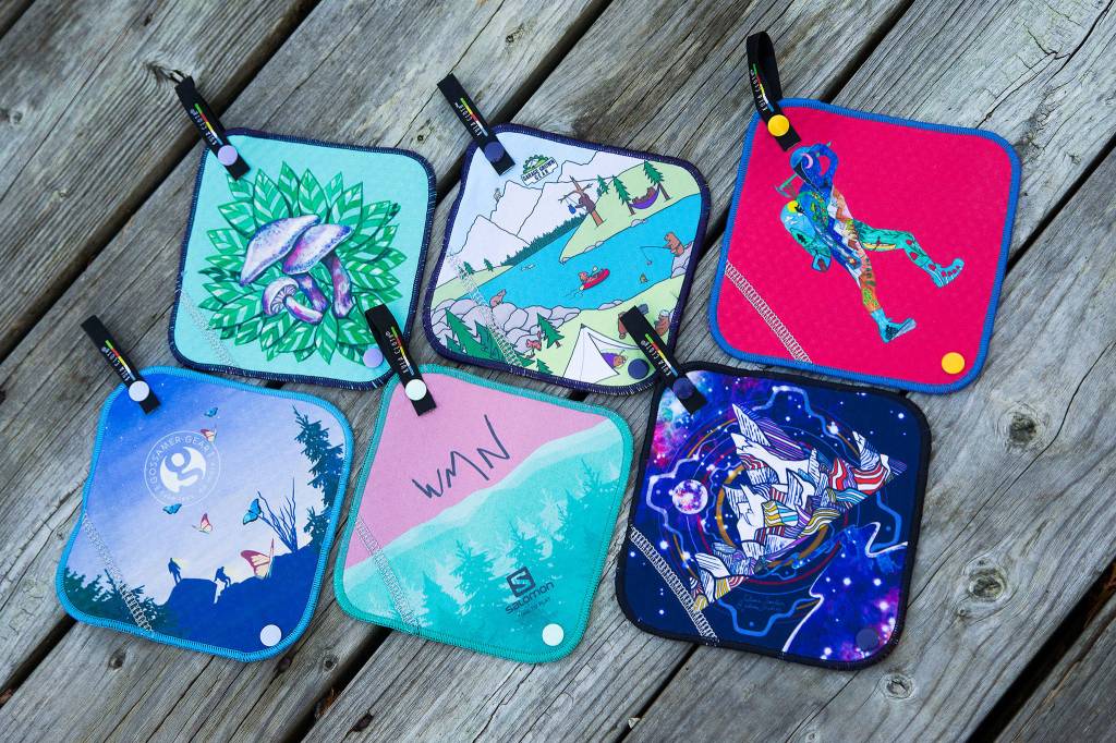 Samples of the Kula Cloth, a $20 pee cloth for women to use in the outdoors. Company founder Anastasia Allison hires artists to create designs for the cloths. (Andy Bronson / The Herald)