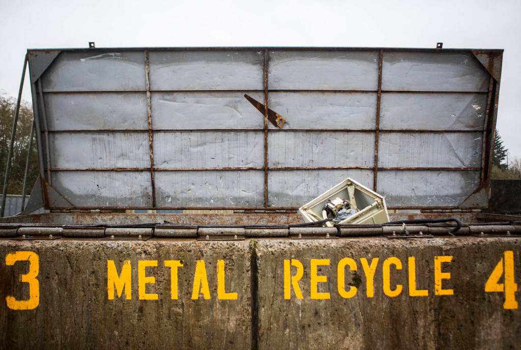 Metal appliances and other metal items fill a recycling container at the Airport Road Recycling & Transfer Station on Nov. 24 in Everett. (Olivia Vanni / The Herald)