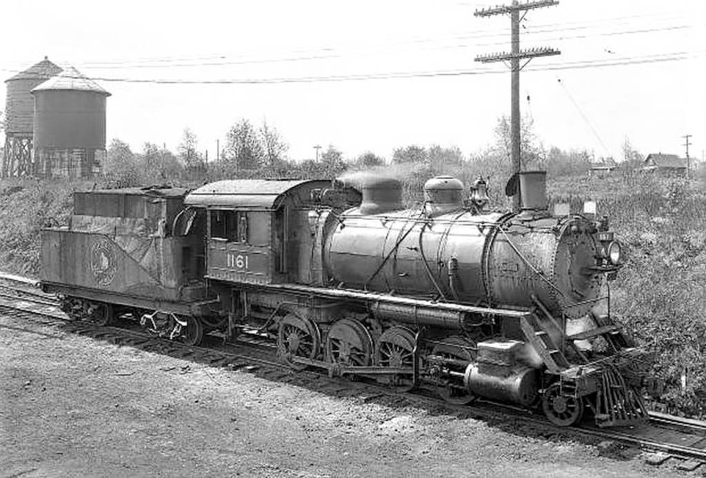 Great Northern locomotive No. 1161, shown in this J.A. Juleen photo taken in 1933 at the Delta Yards in Everett, was built between 1901 and 1907. These F-8 class 2-8-0 locomotives, built to haul freight trains, were originally coal-powered steam engines. By the time this photo was taken, it likely ran on oil. (Everett Public Library, J.A. Juleen)
