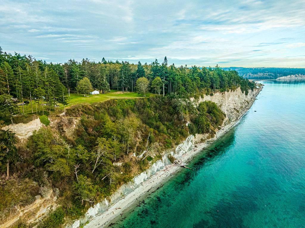 The $6 million Coupeville property is on 60 acres with 860 feet of waterfront. It features a safe house with bulletproof walls, 9,000-square-foot shop, three orchards, four wells and tanks that store 17,000 gallons of propane. (Eddie Hayes / Digital Tide Productions)